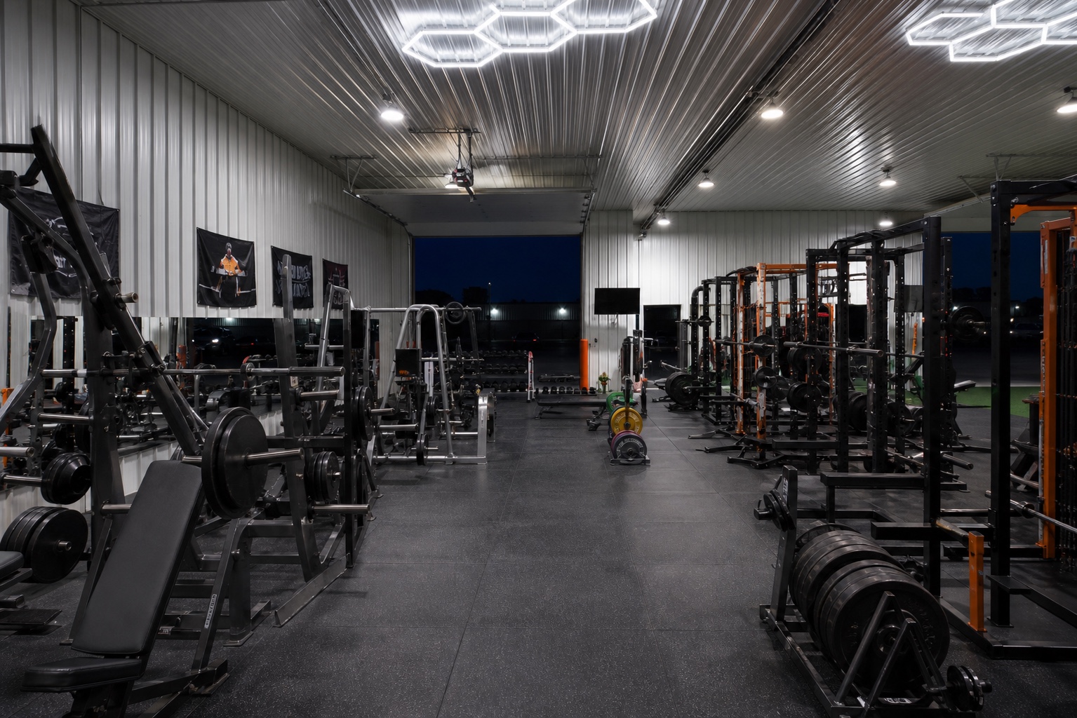 Illuminated Westside training floor during evening member access